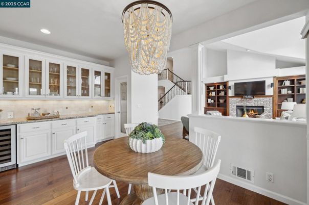 Chandelier, Dining room, Fireplace, Interior, Recessed Lighting, Wood Texture Flooring