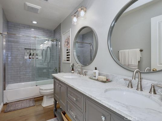 Bathroom, Dual Sink Vanities, Glass Shower, Interior, Recessed Lighting, Wood Texture Flooring