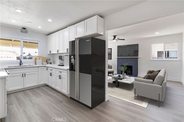 Fireplace, Interior, Kitchen, Living room, Recessed Lighting, Wood Texture Flooring