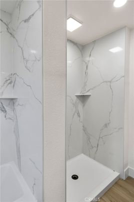 Bathroom, Interior, Marble Walls, Recessed Lighting, Wood Texture Flooring
