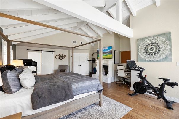 Bedroom, Fireplace, Fitness Equipment, Interior, Wood Texture Flooring