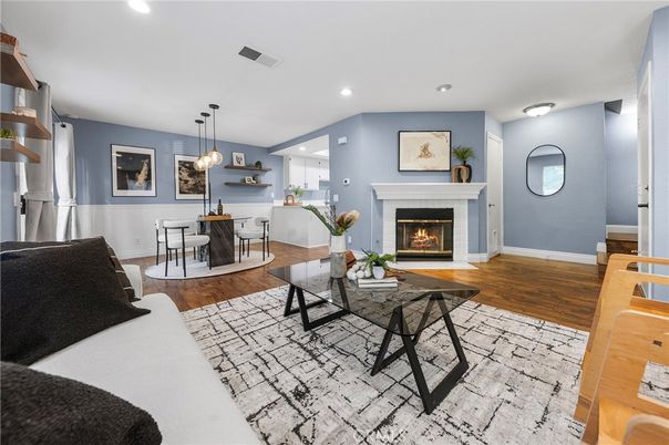 Dining room, Fireplace, Interior, Living room, Pendant Lights, Recessed Lighting, Wood Texture Flooring