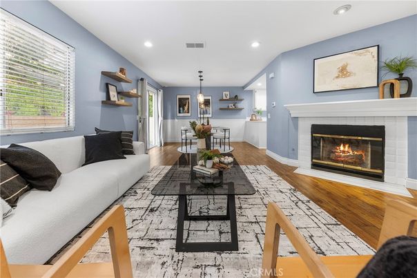 Dining room, Fireplace, Interior, Living room, Pendant Lights, Recessed Lighting, Wood Texture Flooring