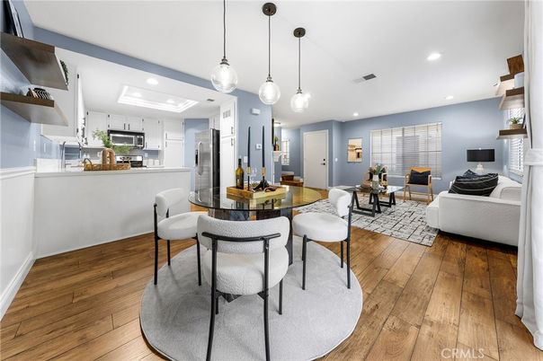 Dining room, Interior, Kitchen, Living room, Pendant Lights, Recessed Lighting, Stainless Steel Appliances, Wood Texture Flooring