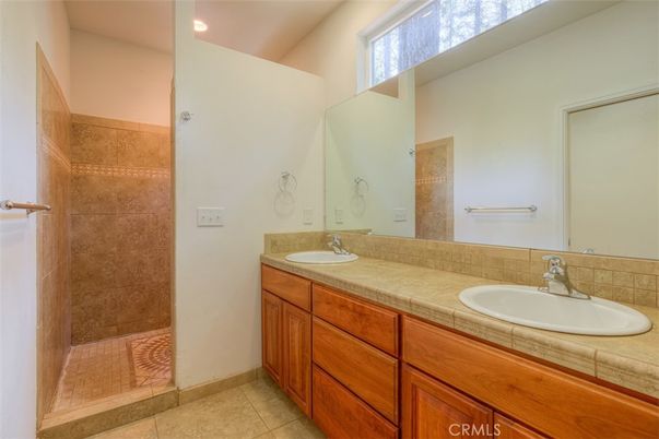 Bathroom, Dual Sink Vanities, Interior, Recessed Lighting, Tile Countertops
