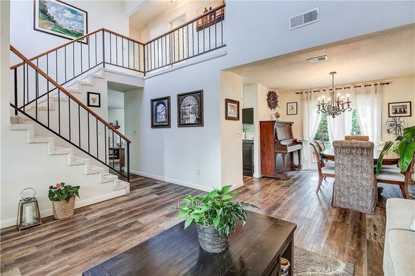 Chandelier, Dining room, Interior, Piano, Wood Texture Flooring