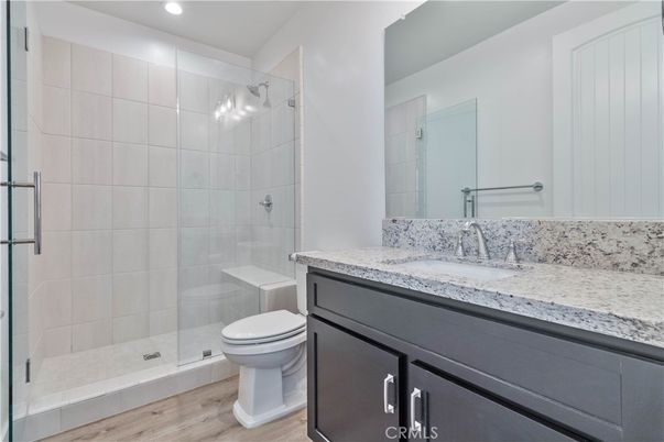 Bathroom, Glass Shower, Interior, Recessed Lighting, Wood Texture Flooring