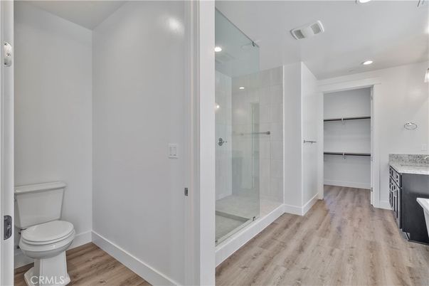 Bathroom, Glass Shower, Interior, Recessed Lighting, Wood Texture Flooring