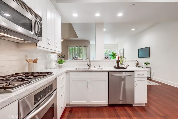 Interior, Kitchen, Recessed Lighting, Stainless Steel Appliances, Wood Texture Flooring