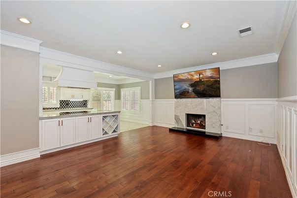 Empty room, Fireplace, Interior, Kitchen, Recessed Lighting, Wood Texture Flooring