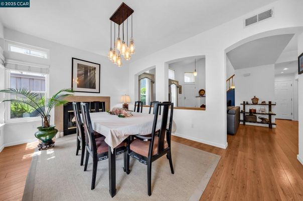 Dining room, Fireplace, Interior, Pendant Lights, Recessed Lighting, Wood Texture Flooring