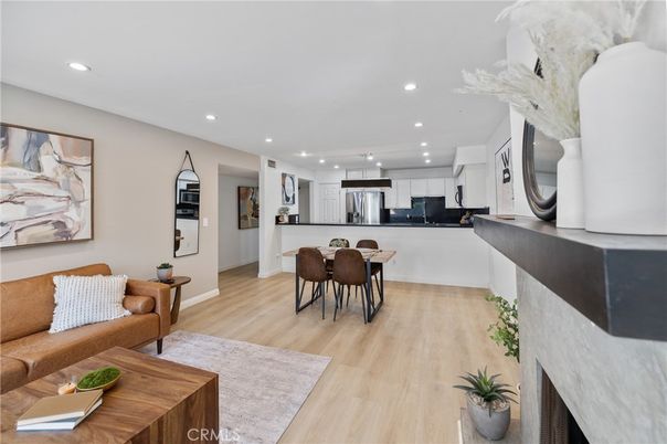 Dining room, Interior, Kitchen, Living room, Recessed Lighting, Stainless Steel Appliances, Wood Texture Flooring