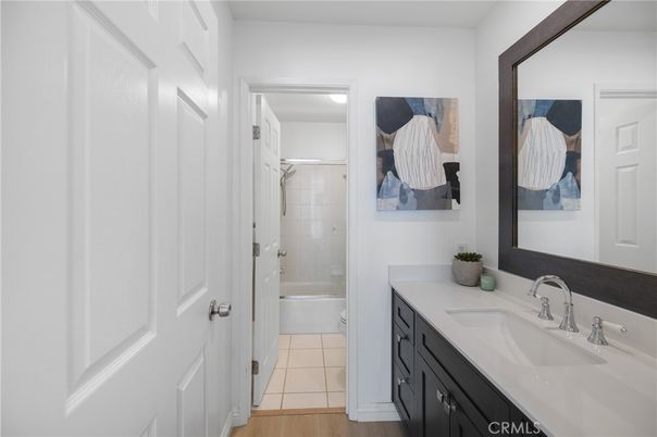 Bathroom, Dual Sink Vanities, Glass Shower, Interior, Wood Texture Flooring