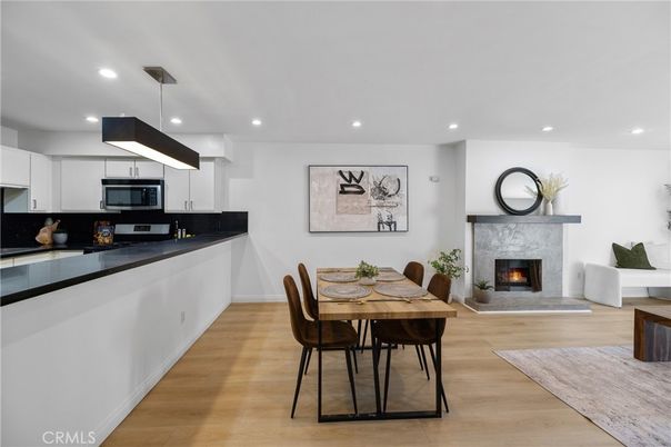 Dining room, Fireplace, Interior, Kitchen, Pendant Lights, Recessed Lighting, Wood Texture Flooring