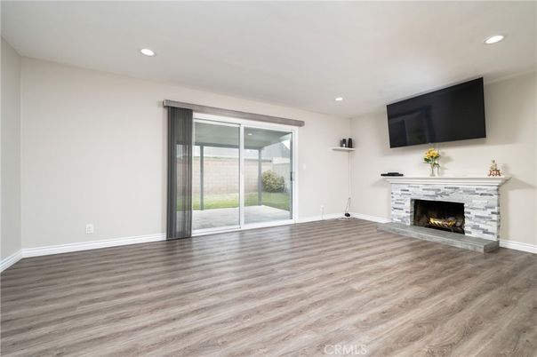 Empty room, Fireplace, Interior, Recessed Lighting, Wood Texture Flooring