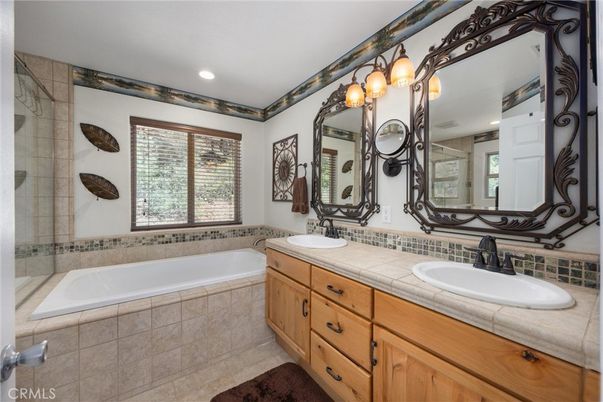 Bathroom, Dual Sink Vanities, Interior, Recessed Lighting, Tile Countertops