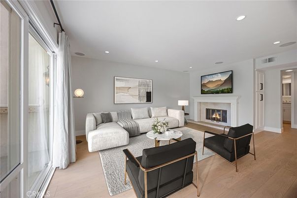 Fireplace, Interior, Living room, Recessed Lighting, Wood Texture Flooring