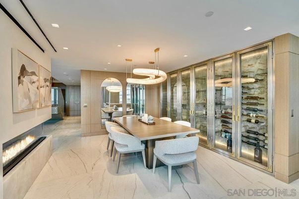 Dining room, Fireplace, Interior, Marble, Pendant Lights, Recessed Lighting, Wine Storage