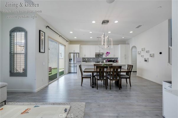 Dining room, Interior, Kitchen, Pendant Lights, Recessed Lighting, Stainless Steel Appliances, Wood Texture Flooring
