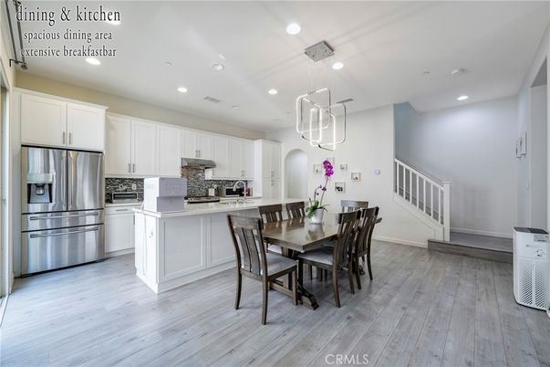 Dining room, Interior, Kitchen, Pendant Lights, Recessed Lighting, Stainless Steel Appliances, Wood Texture Flooring