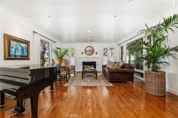 Fireplace, Interior, Living room, Piano, Recessed Lighting, Wood Texture Flooring