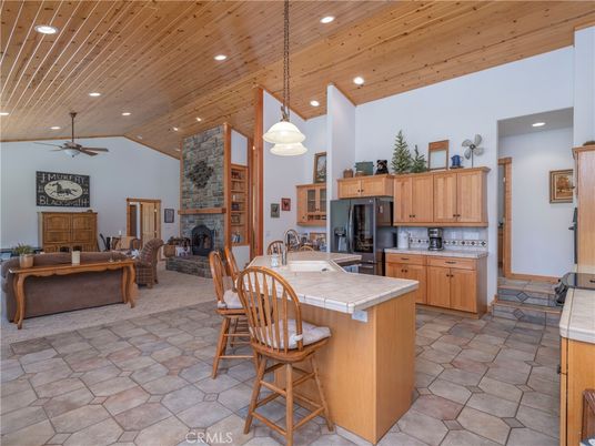 Fireplace, Interior, Kitchen, Pendant Lights, Recessed Lighting, Tile Countertops, Wooden Ceilings