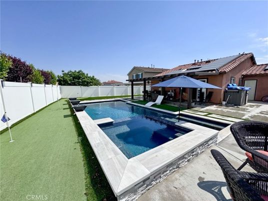 Exterior, Pool, Solar Panels