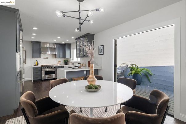 Dining room, Interior, Kitchen, Pendant Lights, Recessed Lighting, Stainless Steel Appliances, Wood Texture Flooring