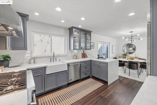 Dining room, Interior, Kitchen, Pendant Lights, Recessed Lighting, Stainless Steel Appliances, Wood Texture Flooring