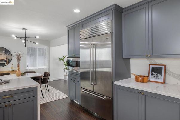 Dining room, Interior, Kitchen, Recessed Lighting, Stainless Steel Appliances, Wood Texture Flooring