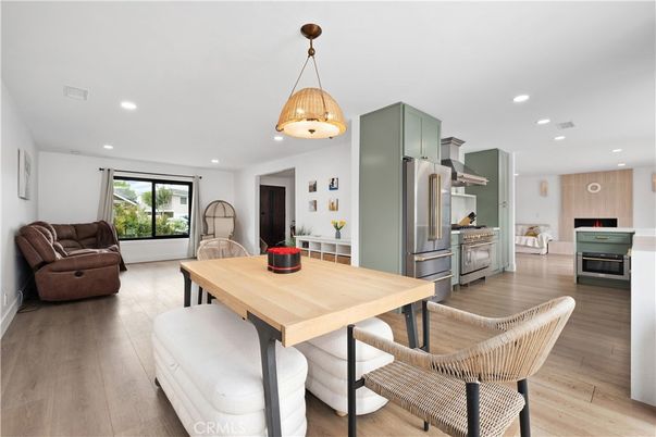 Dining room, Interior, Kitchen, Pendant Lights, Recessed Lighting, Stainless Steel Appliances, Wood Texture Flooring