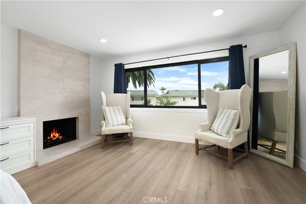 Fireplace, Interior, Recessed Lighting, Water, Wood Texture Flooring
