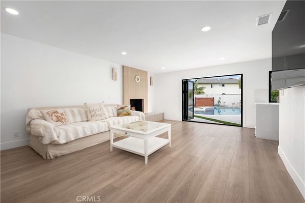 Fireplace, Interior, Living room, Recessed Lighting, Wood Texture Flooring