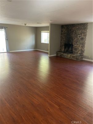 Empty room, Fireplace, Interior, Stone Walls, Wood Texture Flooring