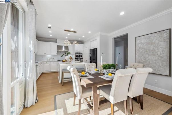 Dining room, Interior, Kitchen, Pendant Lights, Recessed Lighting, Stainless Steel Appliances, Wood Texture Flooring
