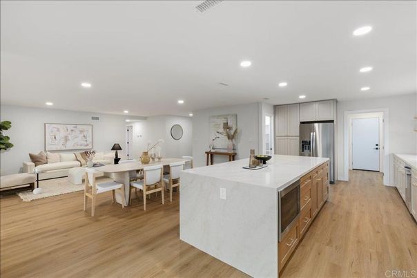Dining room, Interior, Kitchen, Living room, Recessed Lighting, Stainless Steel Appliances, Wood Texture Flooring