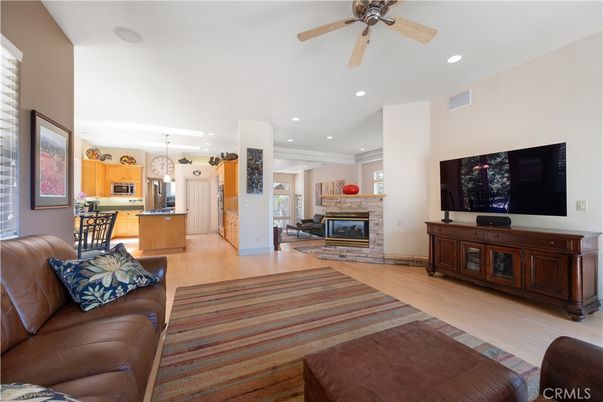 Fireplace, Interior, Kitchen, Living room, Pendant Lights, Recessed Lighting, Stainless Steel Appliances, Wood Texture Flooring