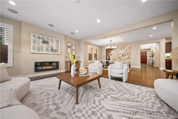 Chandelier, Dining room, Fireplace, Interior, Living room, Recessed Lighting, Wood Texture Flooring