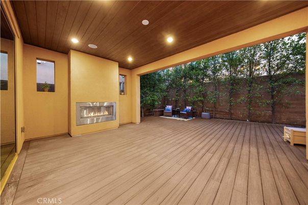 Exterior, Fireplace, Wood Texture Flooring