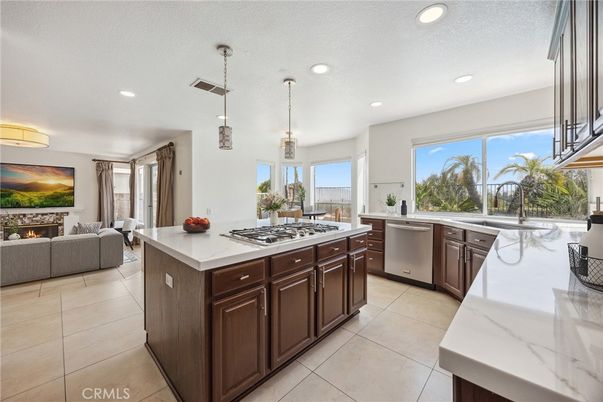 Fireplace, Interior, Kitchen, Living room, Pendant Lights, Recessed Lighting, Stainless Steel Appliances