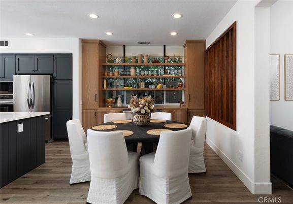 Dining room, Interior, Kitchen, Recessed Lighting, Stainless Steel Appliances, Wood Texture Flooring