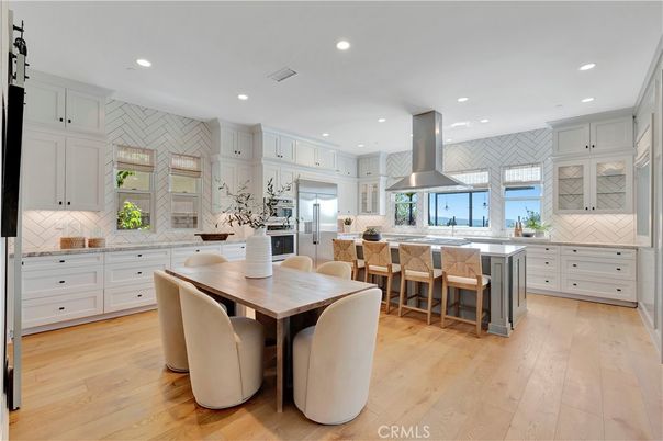 Dining room, Interior, Kitchen, Recessed Lighting, Stainless Steel Appliances, Wood Texture Flooring