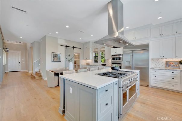 Dining room, Interior, Kitchen, Recessed Lighting, Stainless Steel Appliances, Wood Texture Flooring