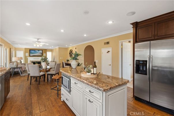 Dining room, Interior, Kitchen, Recessed Lighting, Stainless Steel Appliances, Wood Texture Flooring