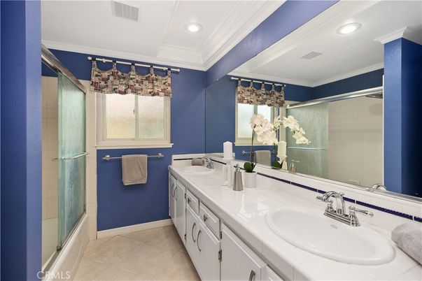 Bathroom, Dual Sink Vanities, Glass Shower, Interior, Recessed Lighting, Tile Countertops