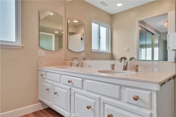 Bathroom, Dual Sink Vanities, Interior, Recessed Lighting, Wood Texture Flooring