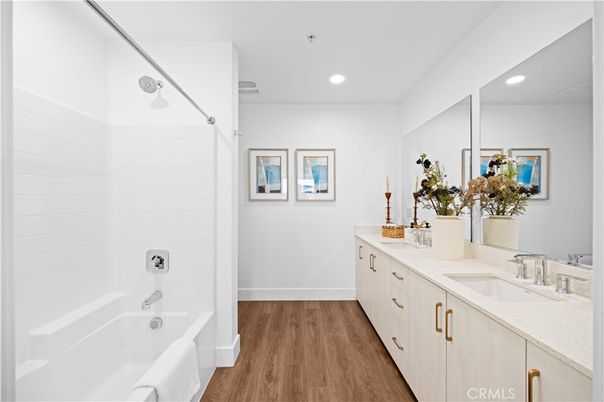 Bathroom, Dual Sink Vanities, Interior, Recessed Lighting, Wood Texture Flooring