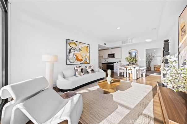 Dining room, Interior, Kitchen, Living room, Recessed Lighting, Stainless Steel Appliances, Wood Texture Flooring