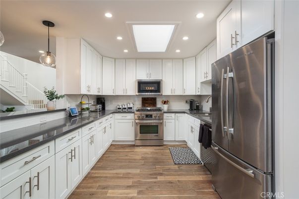 Interior, Kitchen, Pendant Lights, Recessed Lighting, Stainless Steel Appliances, Wood Texture Flooring