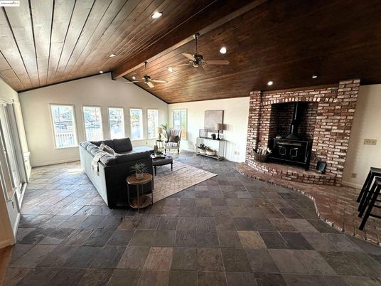 Fireplace, Interior, Living room, Recessed Lighting, Stone Walls, Wooden Ceilings